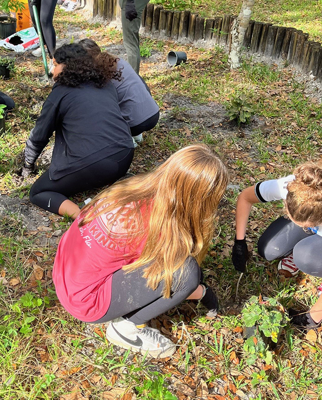 Students gardening